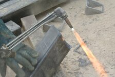 workers-construction-site-cutting-metal-using-blowtorch-produced-very-high-temperature-flame-a...jpg